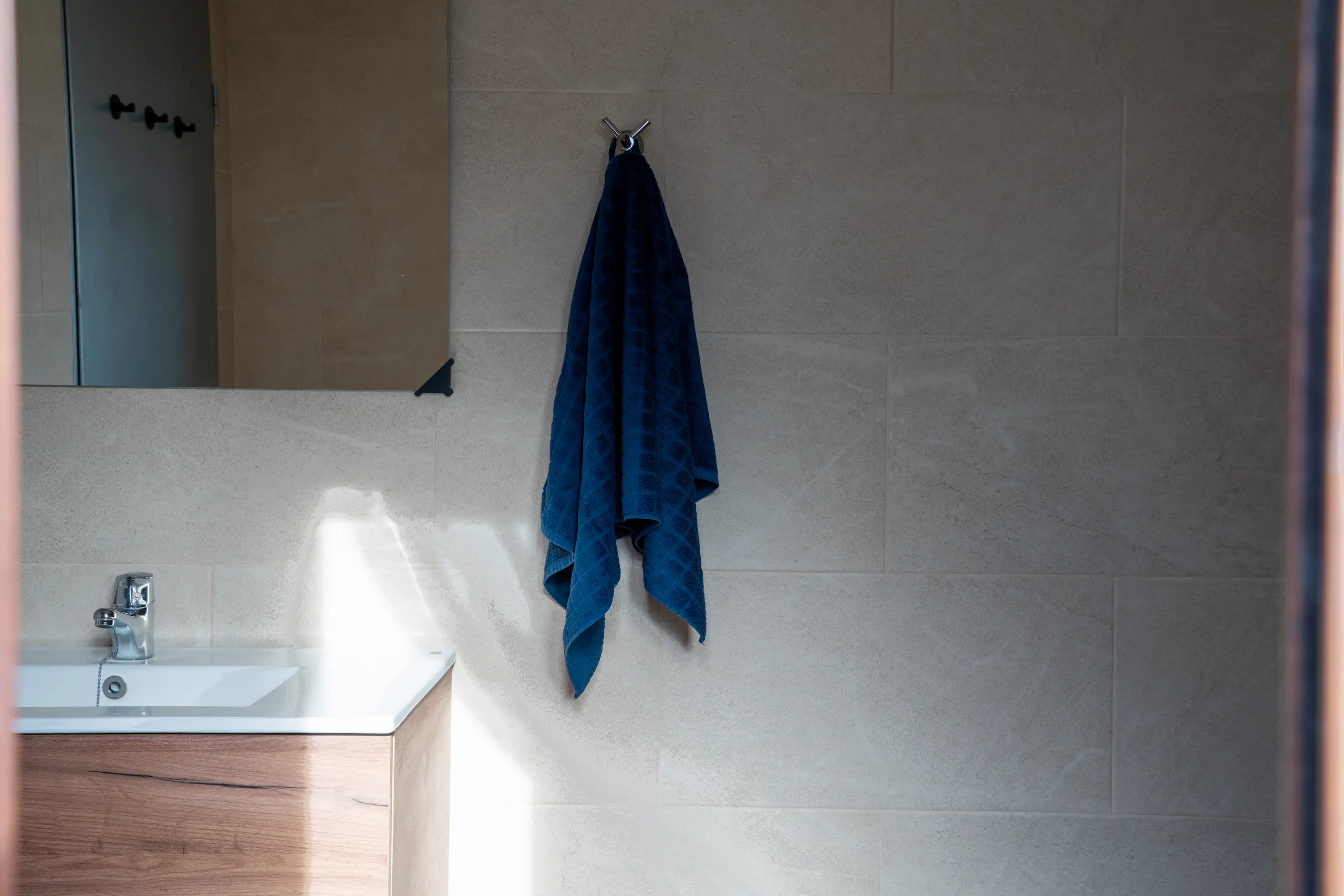 Detalle de toallas en el baño
